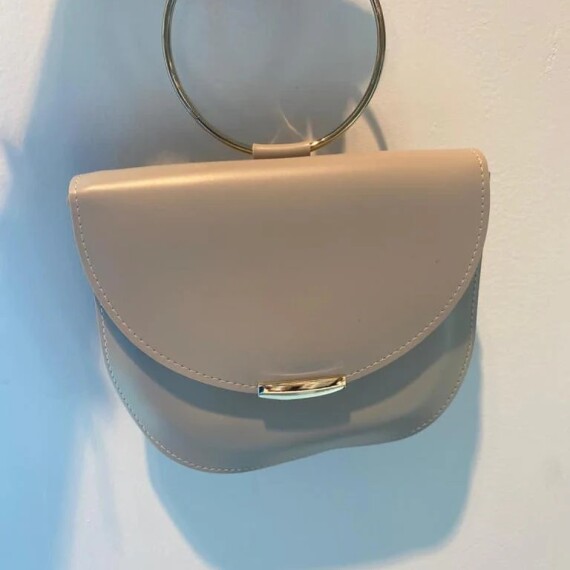 https://rawda-sy.kyveli.me/products/bracelet-bag