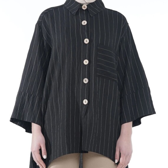 https://rawda-sy.kyveli.me/products/buttoned-shirt