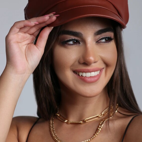 https://rawda-sy.kyveli.me/products/leather-solid-baker-boy-hat