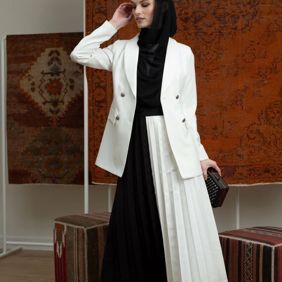 https://rawda-sy.kyveli.me/products/cruella-skirt