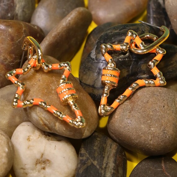 https://rawda-sy.kyveli.me/products/shooting-star-earrings