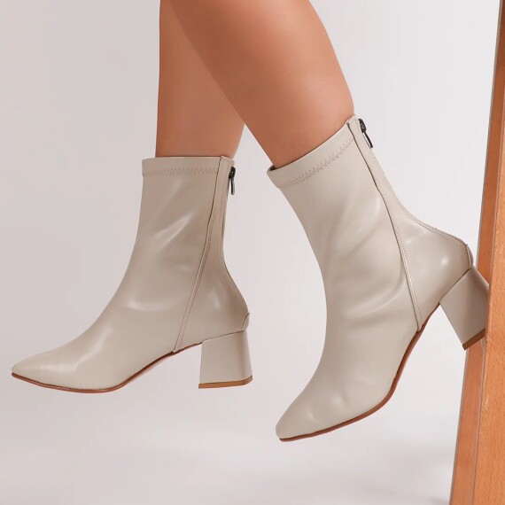 https://rawda-sy.kyveli.me/products/solid-back-zipper-classic-boots