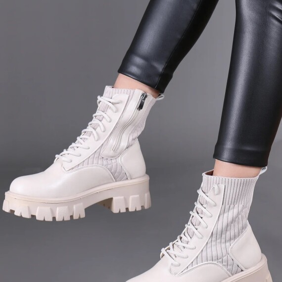 https://rawda-sy.kyveli.me/products/knit-sock-boots