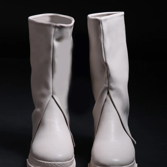 https://rawda-sy.kyveli.me/products/minimalist-ankle-boots