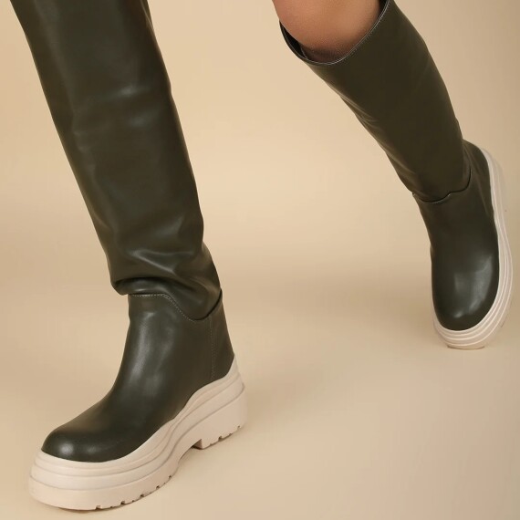 https://rawda-sy.kyveli.me/products/high-leather-boots