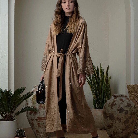 https://rawda-sy.kyveli.me/products/pearled-abaya