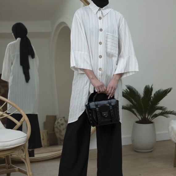 https://rawda-sy.kyveli.me/products/black-trouser