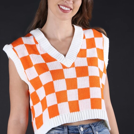 https://rawda-sy.kyveli.me/products/gingham-sweater-vest