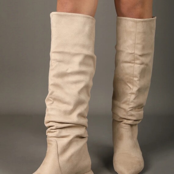 https://rawda-sy.kyveli.me/products/suede-tee-boots