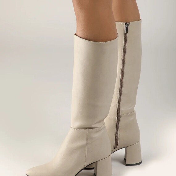 https://rawda-sy.kyveli.me/products/mid-week-boots
