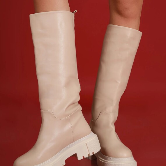 https://rawda-sy.kyveli.me/products/long-rainy-day-boots