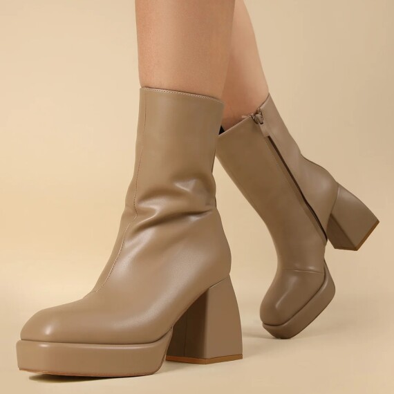 https://rawda-sy.kyveli.me/products/rex-rectangular-boots