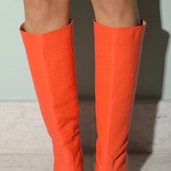 https://rawda-sy.kyveli.me/products/croco-skin-boots