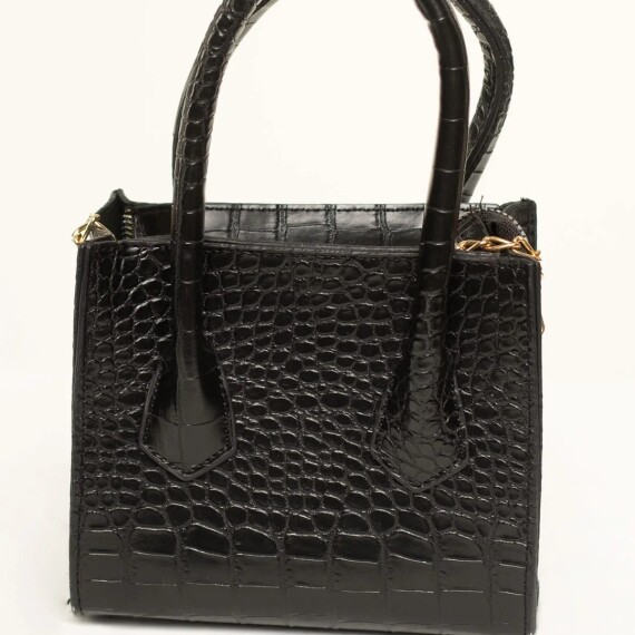 https://rawda-sy.kyveli.me/products/purse