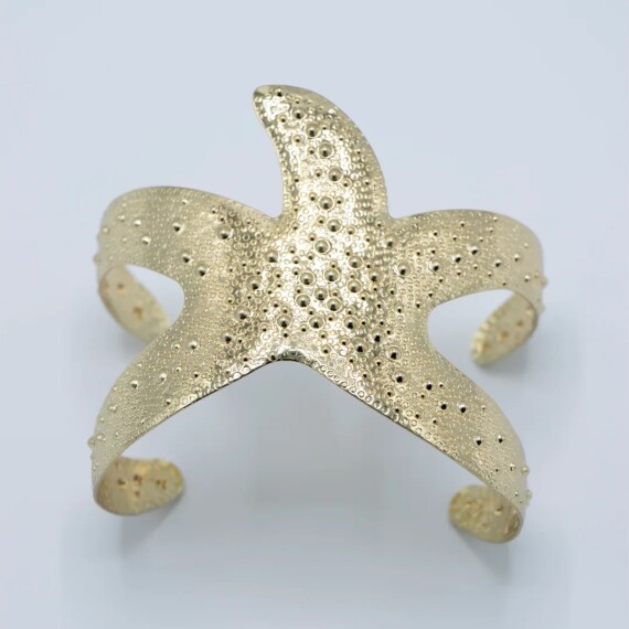 https://rawda-sy.kyveli.me/products/star-bracelet