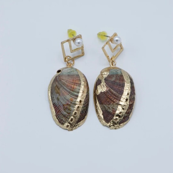 https://rawda-sy.kyveli.me/products/shell-shaped