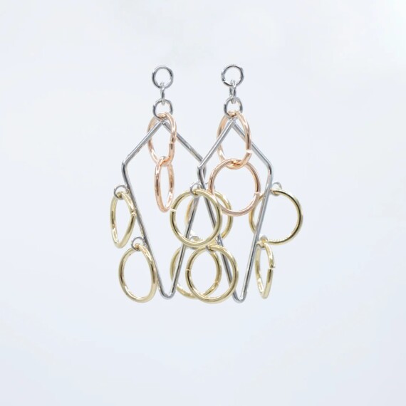 https://rawda-sy.kyveli.me/products/rhombus-with-circles