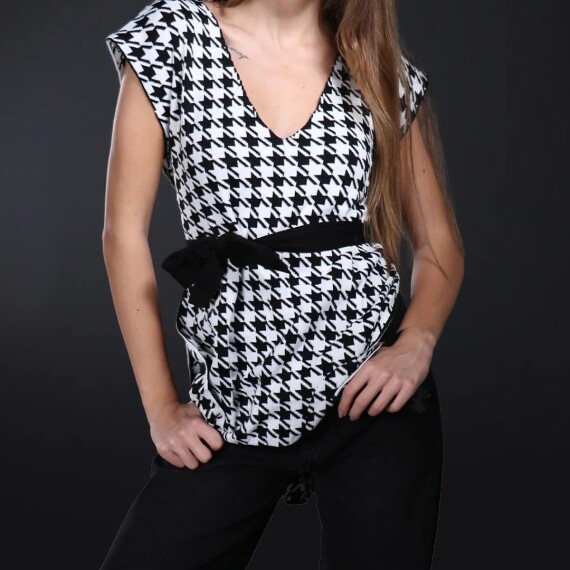https://rawda-sy.kyveli.me/products/houndstooth-dress