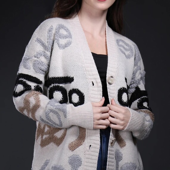 https://rawda-sy.kyveli.me/products/cardigan-dress