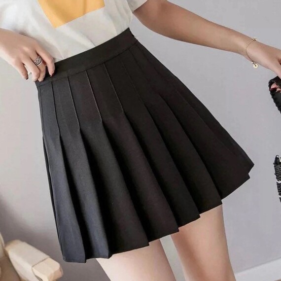 https://rawda-sy.kyveli.me/products/pleated-mini-skirt