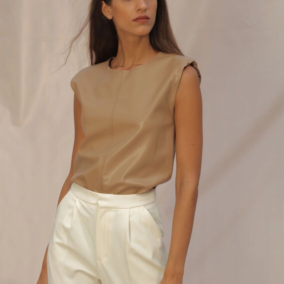 https://rawda-sy.kyveli.me/products/leather-shoulders-pads-top